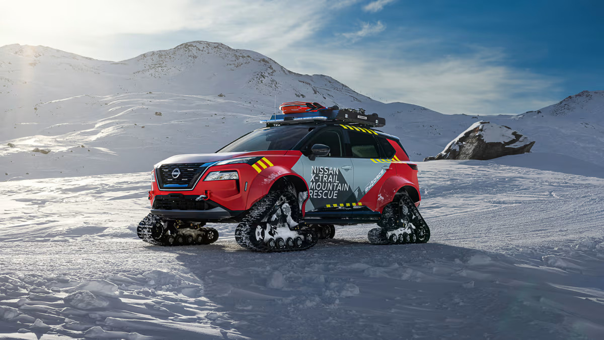 This Nissan X-Trail, Fitted with Tank Tracks, Is Prepared for Mountain Rescue Operations.