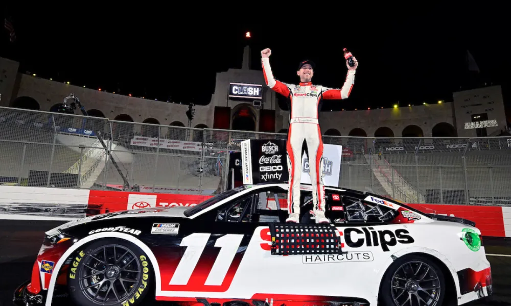 Denny Hamlin fends off Busch to secure victory in NASCAR's L.A. Clash.