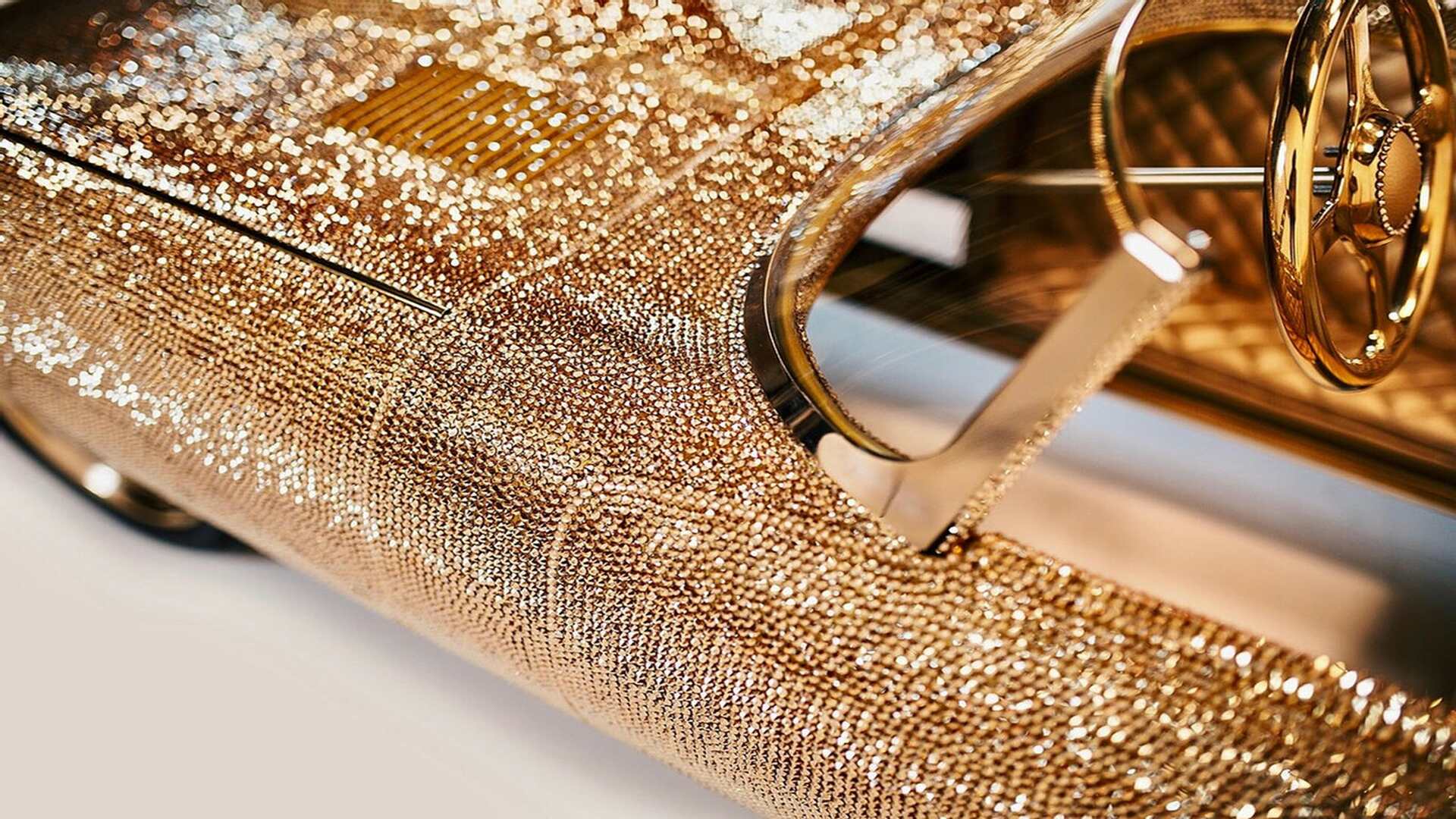 A Closeup Look Of The Swarovski-Crystal Encrusted Jaguar E-Type Pedal Car