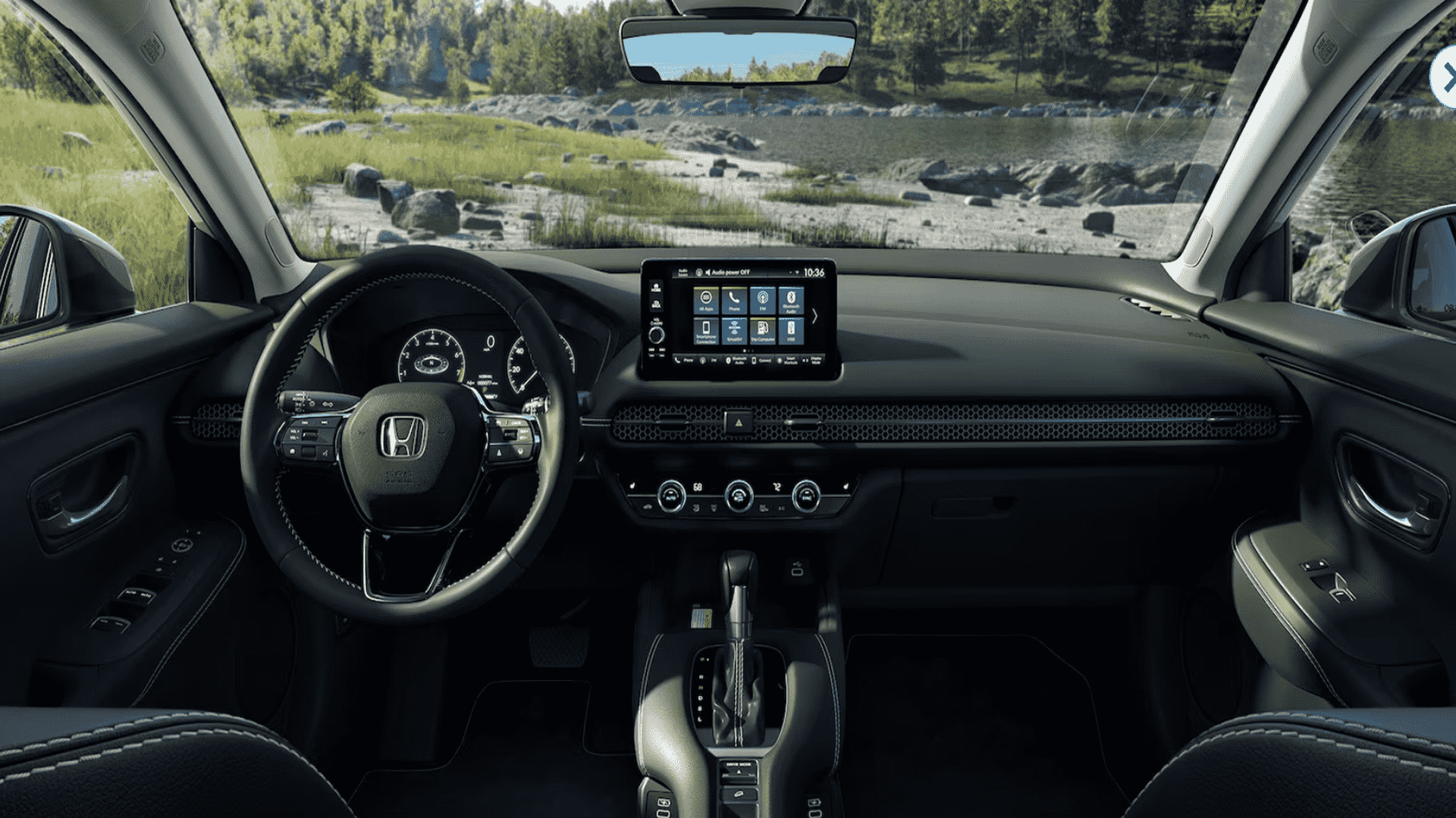 The Interior, Steering, And Central Console Of The 2024 Honda HR-V