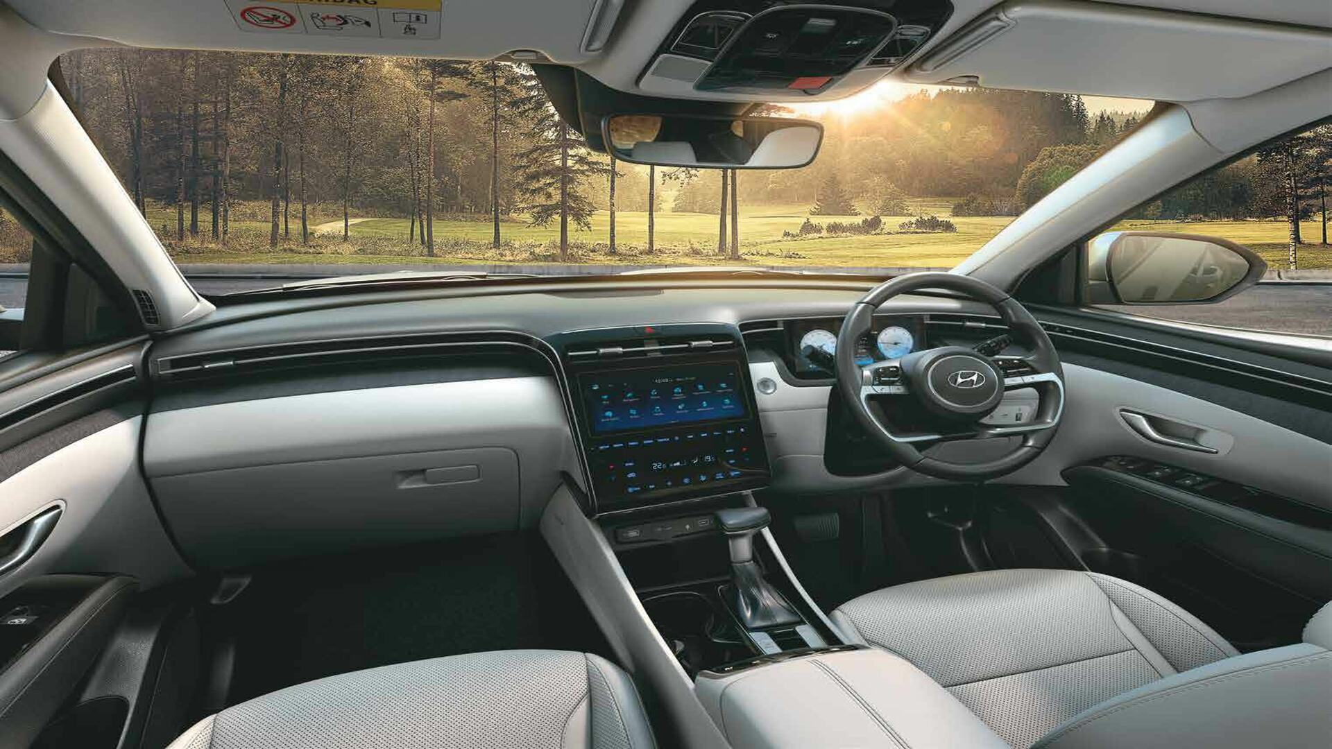 The Interior, Steering, Dashboard, And Central Console Of A Hyundai Tucson (Credits Hyundai Tucson Brochure )
