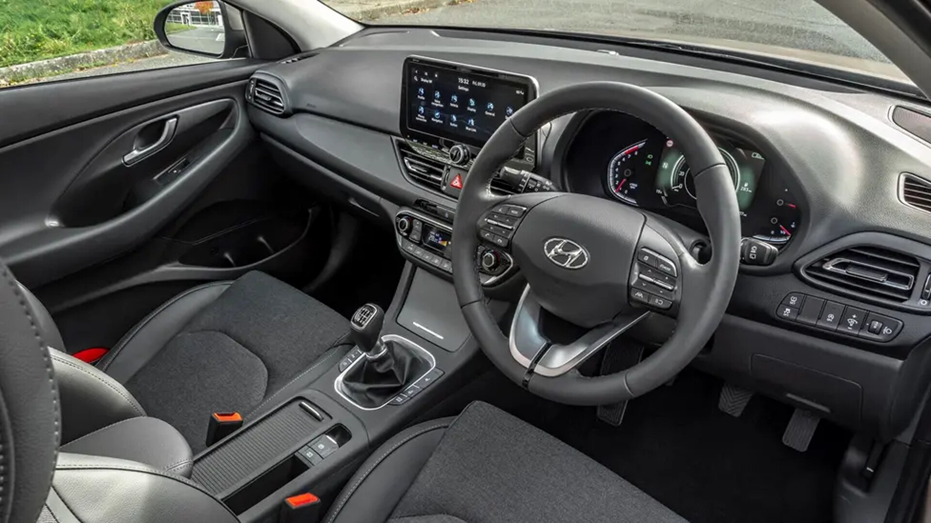 The Interior, Steering, Dashboard, And Central Console Of A Hyundai i30 (Credits Hyundai)
