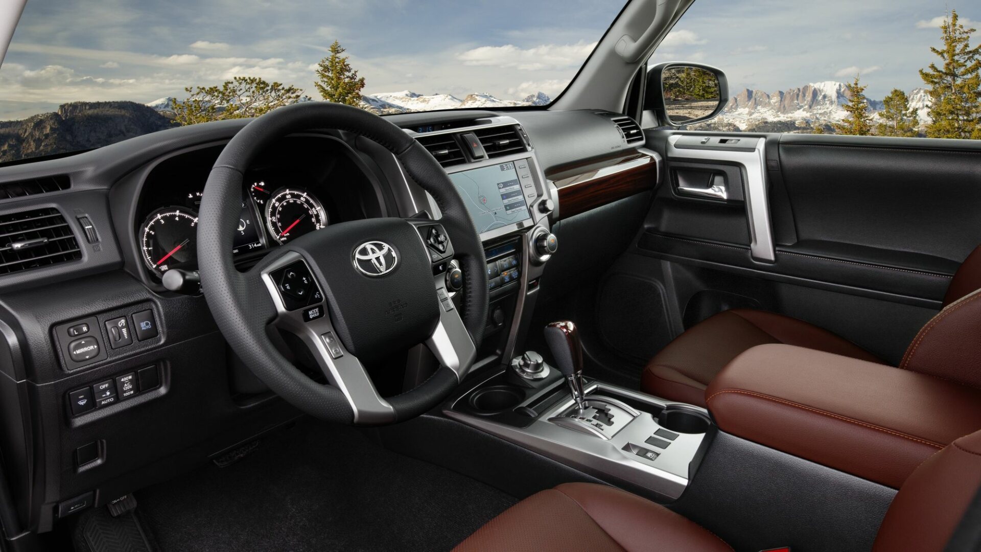The Interior, Steering, Dashboard, And Central Console Of A Toyota 4Runner