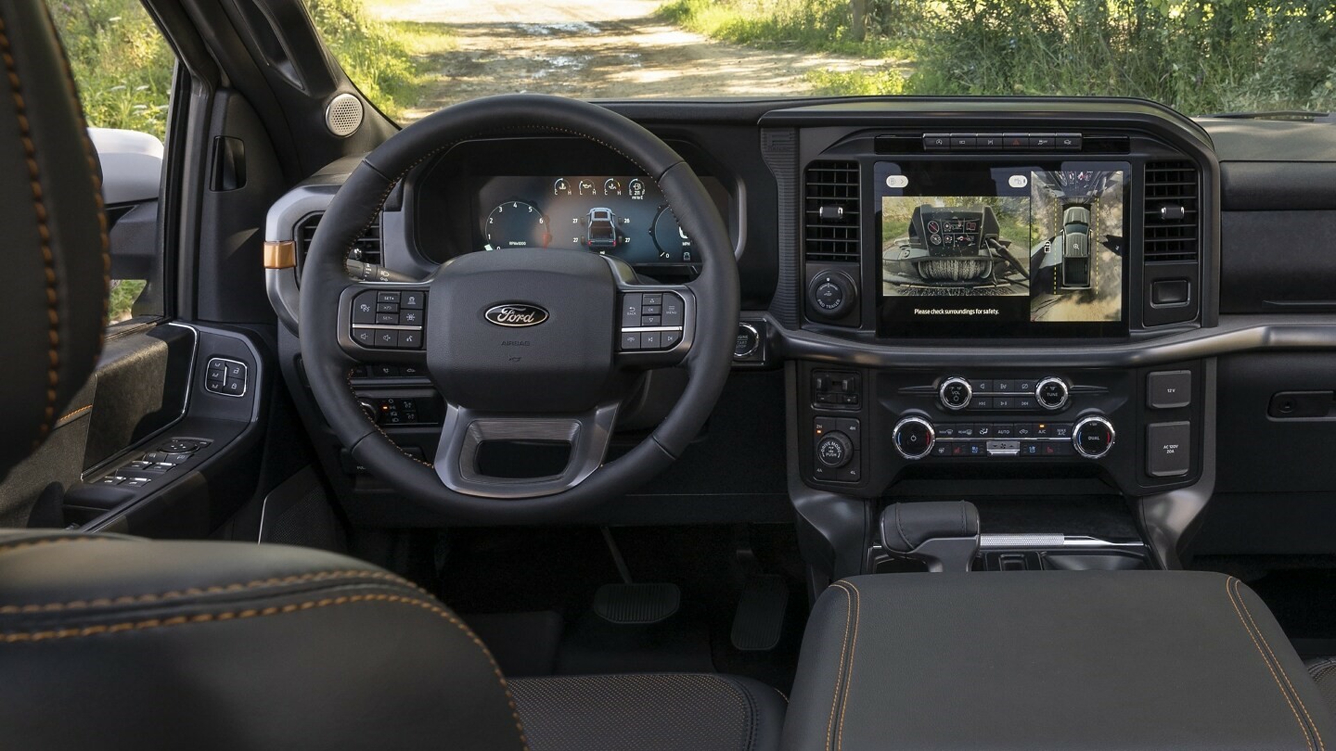 The Steering And Central Console Of A Ford F-150