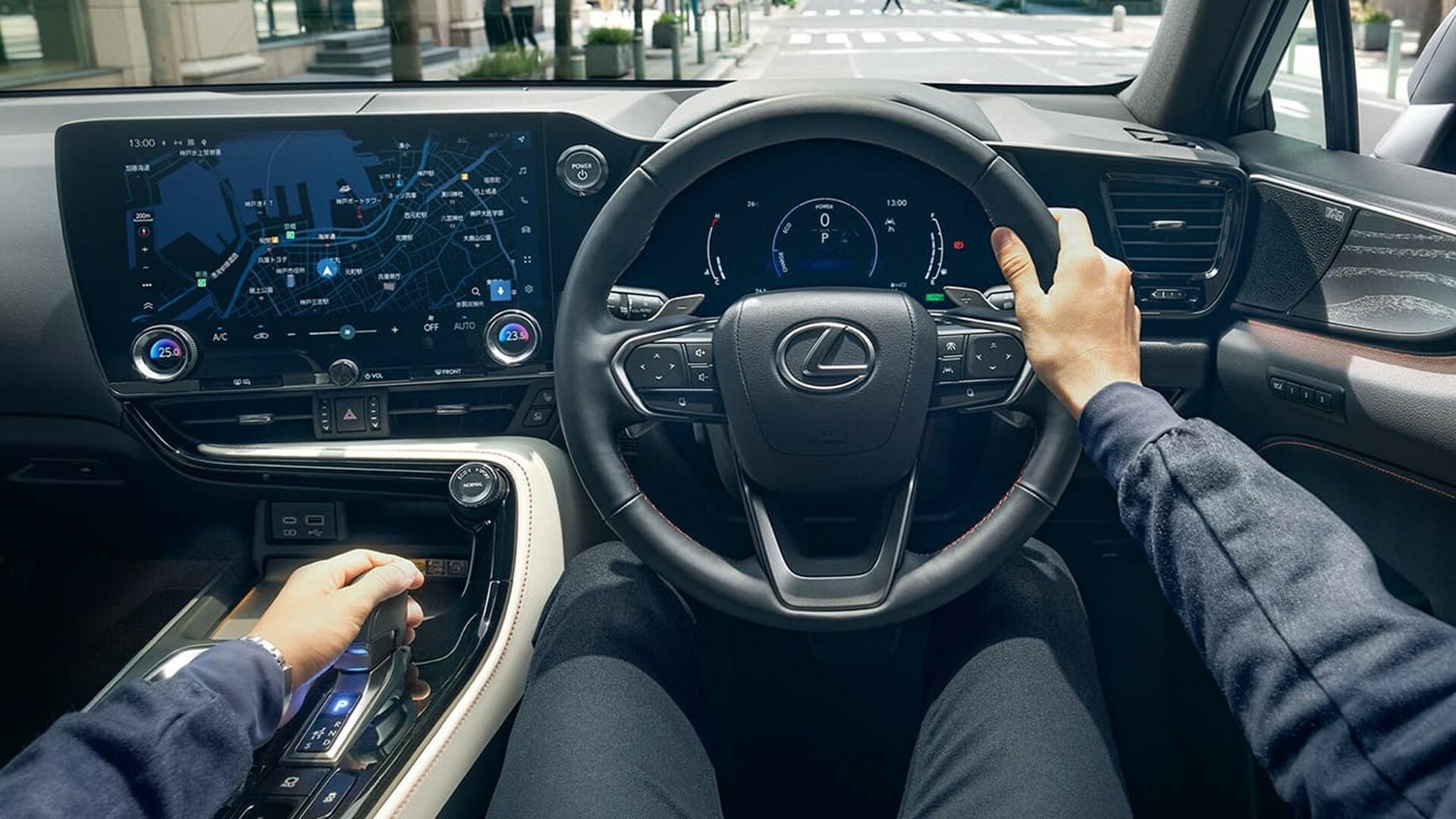 The Steering, Dashboard, And Central Console Of A Lexus NX