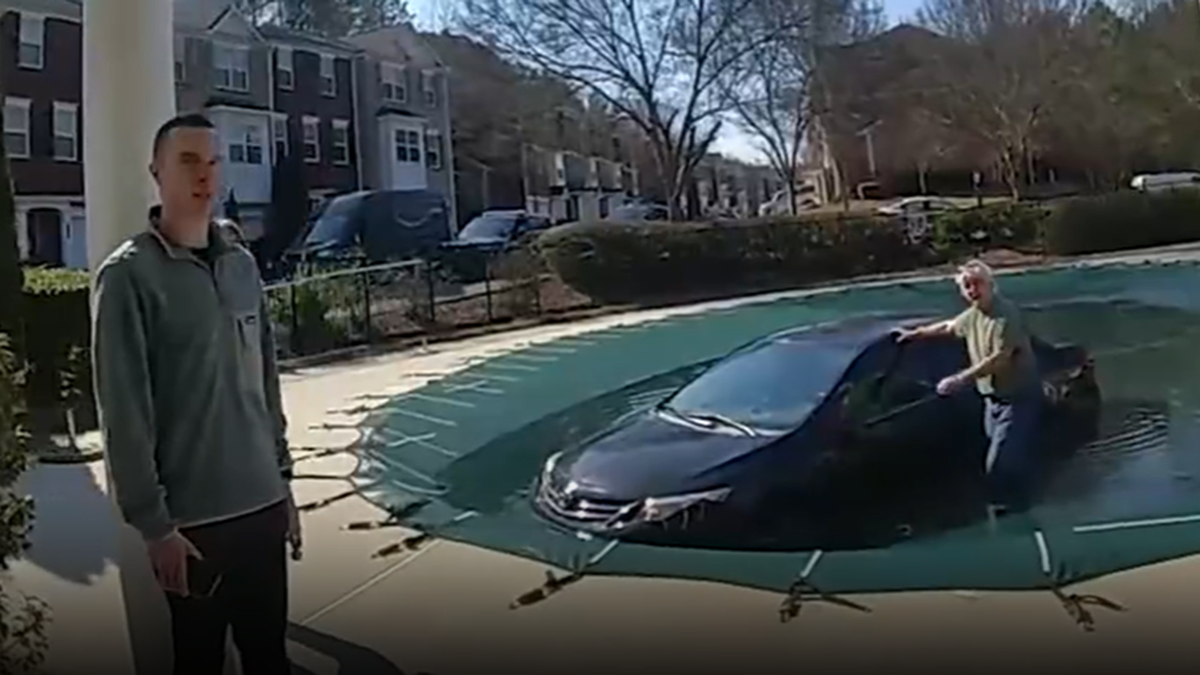 Driver's Vehicle Lodged on Pool Cover Following Medical Emergency