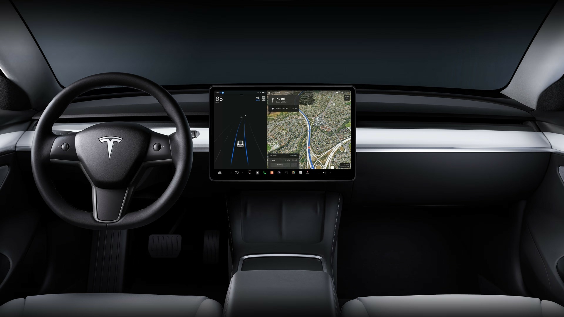The Interior, Steering, And Central Console Of A Tesla Model Y (Credits Tesla)