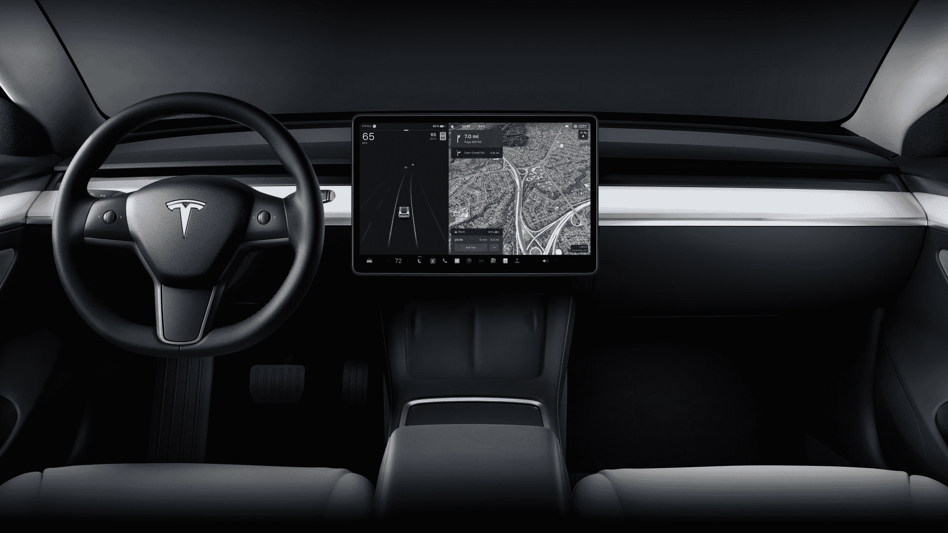 The Interior, Steering, Dashboard, And Central Console Of A 2024 Tesla Model Y (Credits Tesla)