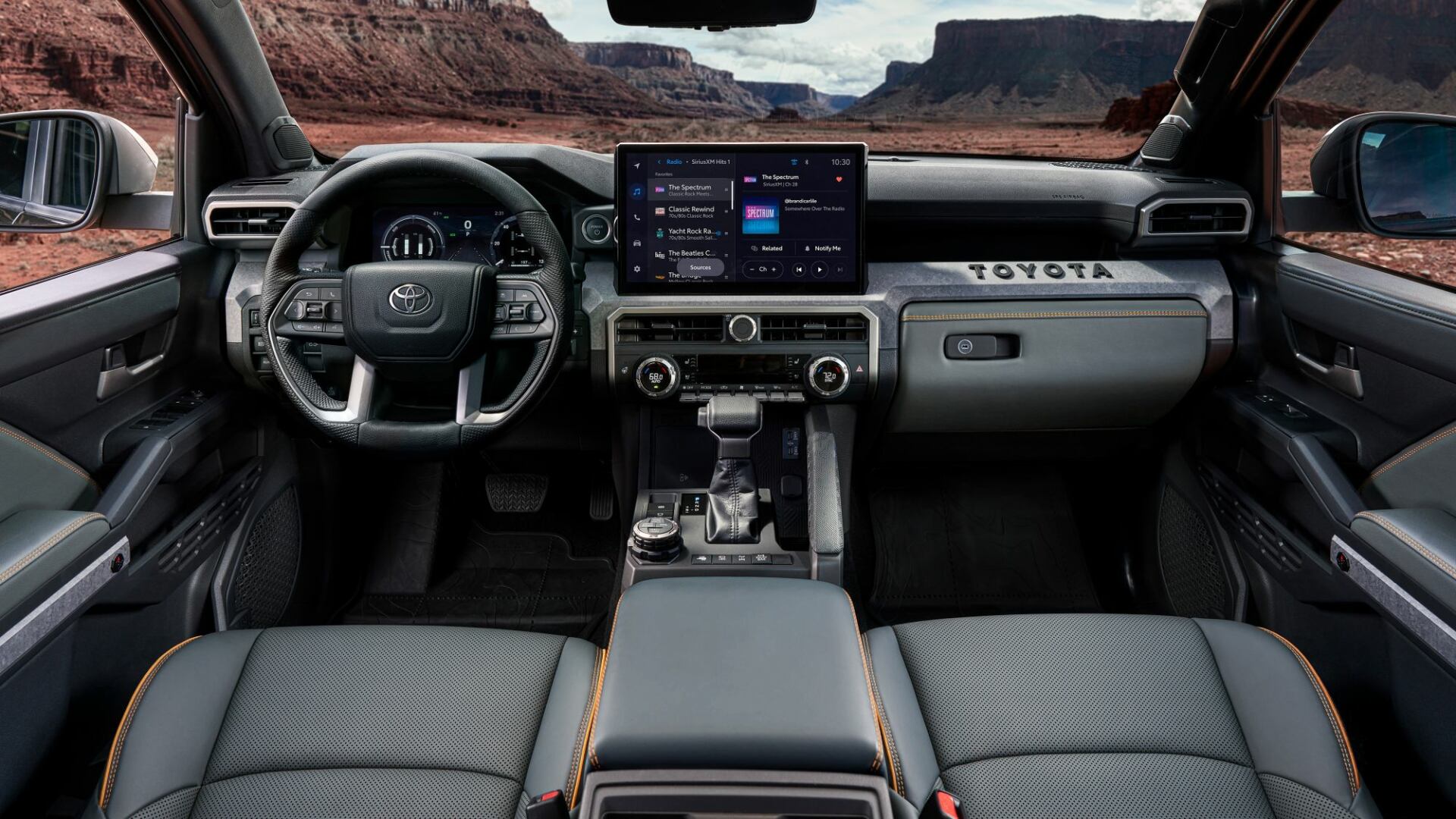 The Interior, Steering, Dashboard, And Central Console Of A 2024 Toyota Tacoma (Credits Toyota)