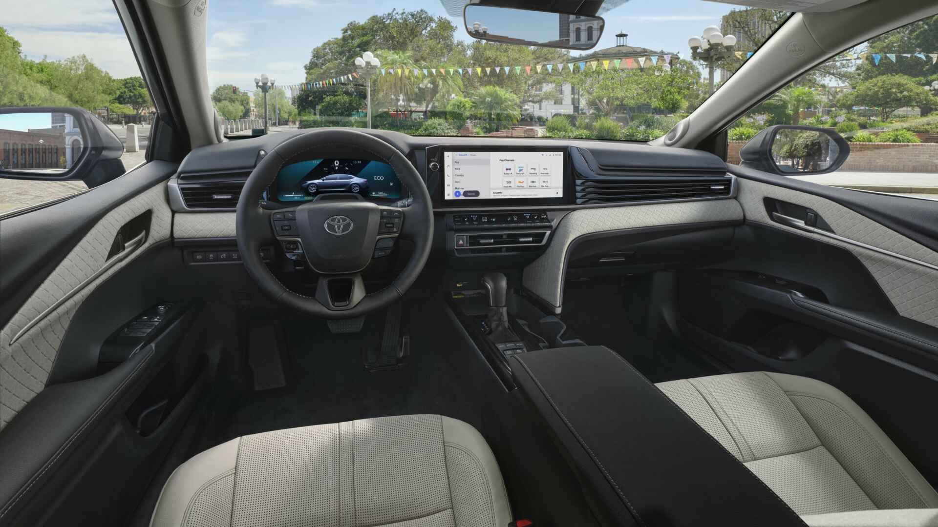 The Interior, Steering, Dashboard, And Central Console Of A 2025 Toyota Camry (Credits Toyota Pressroom)