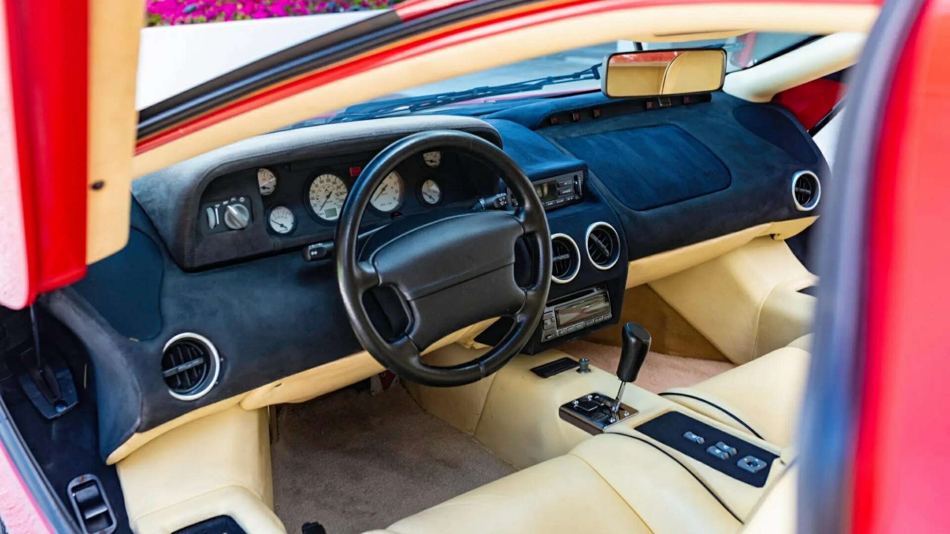 The Interior, Steering, Dashboard, And Central Console Of A (Credits Bring A Trailer)
