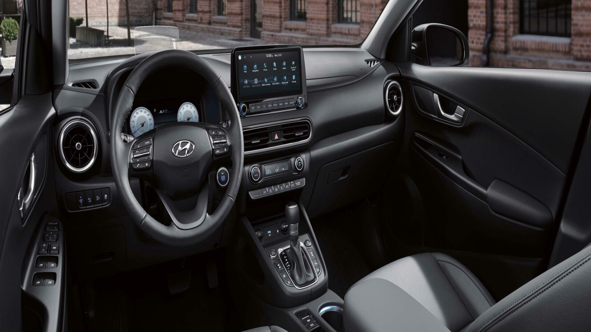 The Interior, Steering, Dashboard, And Central Console Of A Hyundai Kona (Credits Hyundai)