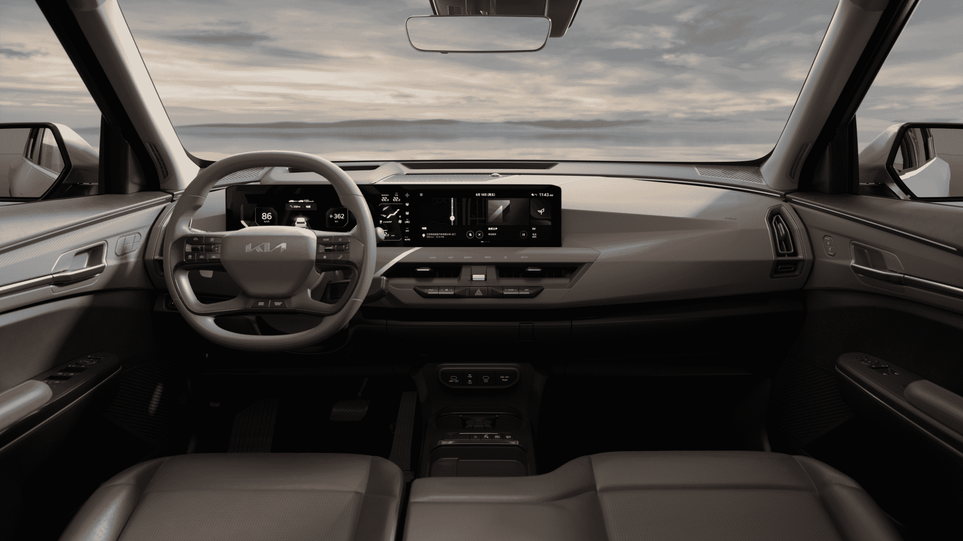 The Interior, Steering, Dashboard, And Central Console Of A Kia EV5 (Credits Kia Global Media Center)