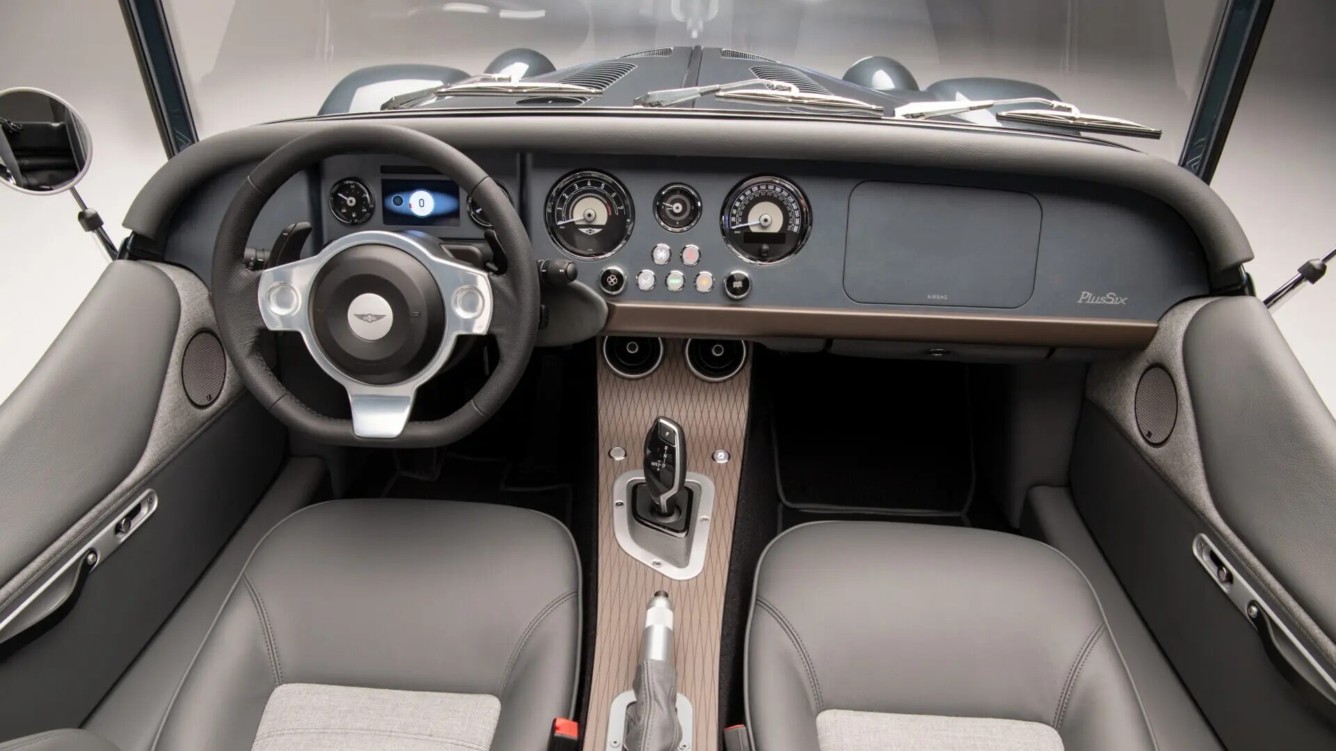 The Interior, Steering, Dashboard, And Central Console Of A Morgan Plus Six (Credits Morgan Motor Company)