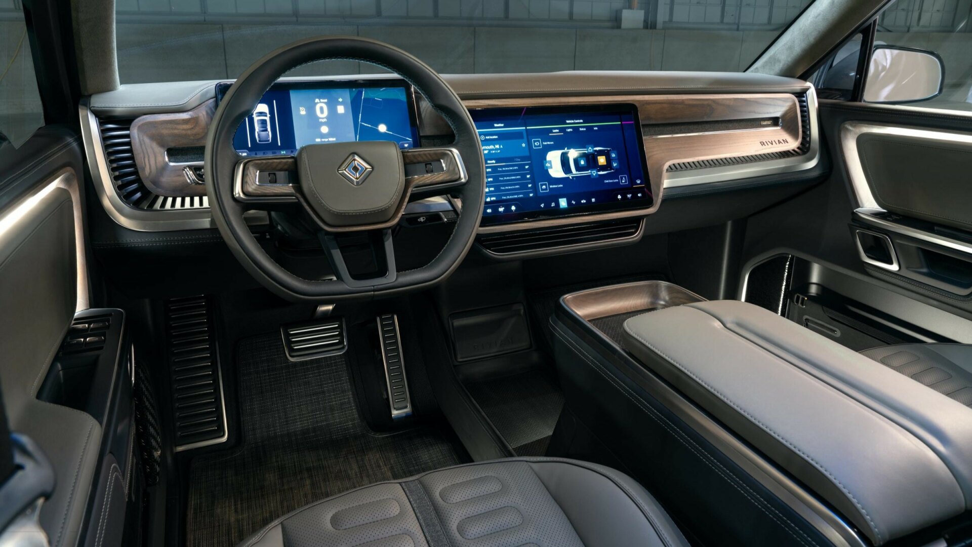 The Interior, Steering, Dashboard, And Central Console Of A Rivian R1T (Credits Rivian)