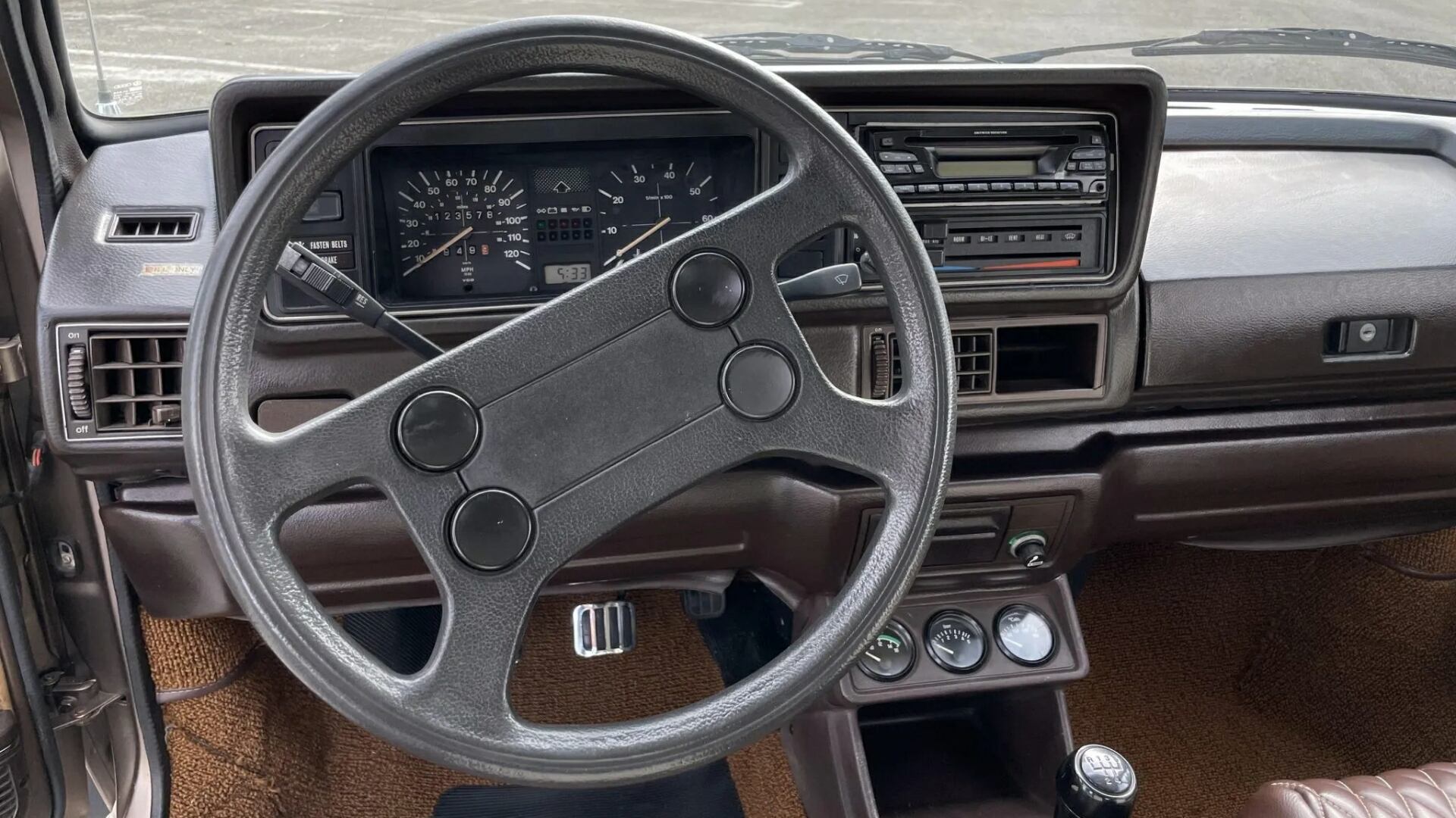 The Steering And Dashboard Of The 1984 VW Rabbit Convertible (Credits Bring A Trailer)