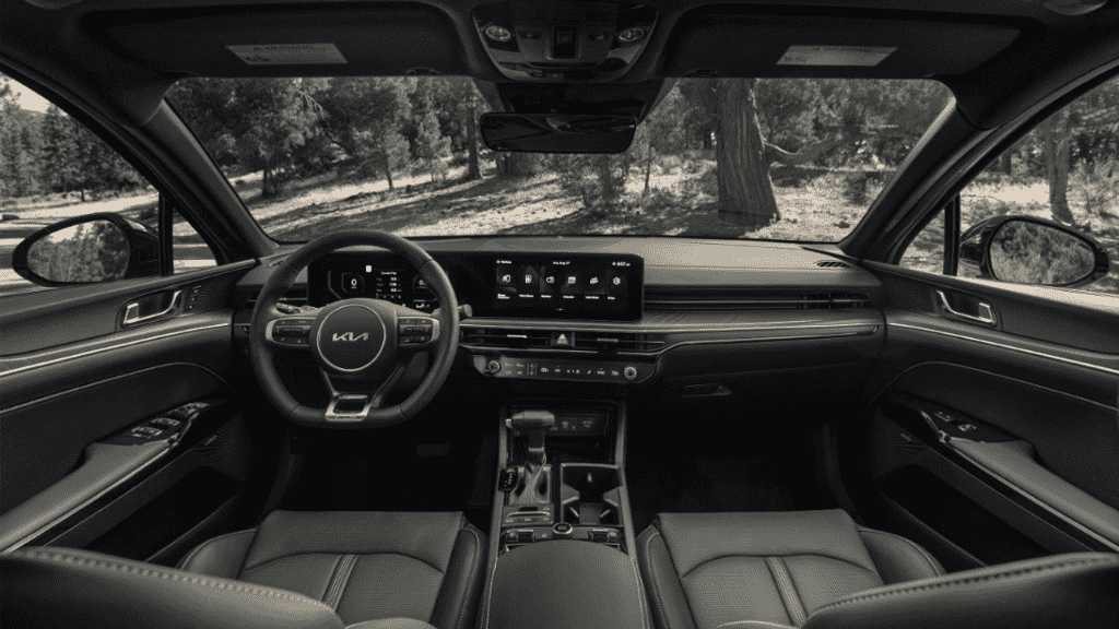 The Steering, Dashboard, And Central Console Of A 2025 Kia K5 EX Sedan (Credits Kia)