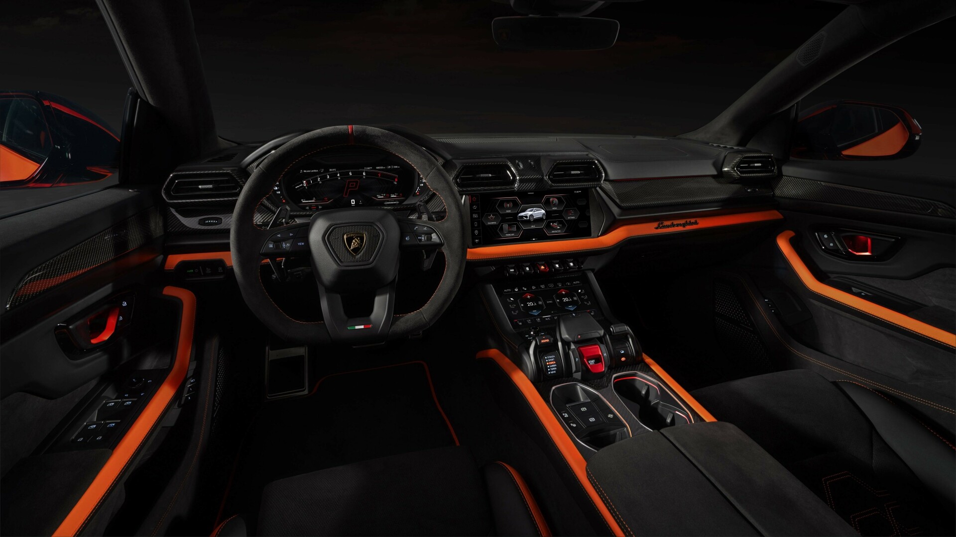 The Steering, Dashboard, And Central Console The New Lamborghini Urus SE - Interior Shade Arancio Apodis (Credits Lamborghini Media Centre)