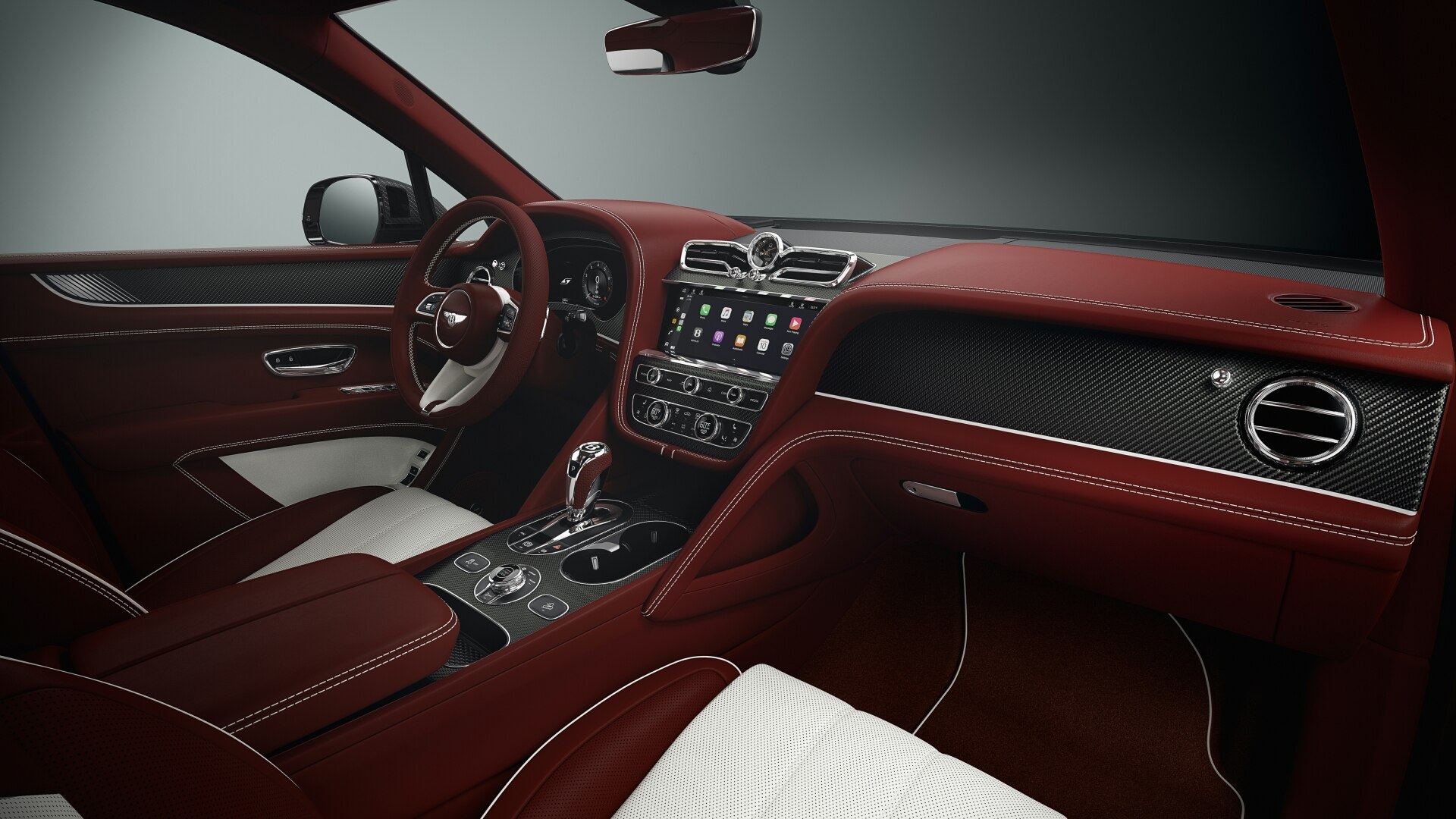 The Steering Wheel, Dashboard, And Central Console Of A Bentley Bentayga Apex Edition (Bentley Newsroom)