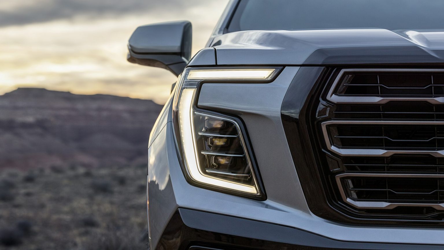 2025 GMC Yukon AT4 Teases Redesigned Front End Ahead Of Debut DAX Street