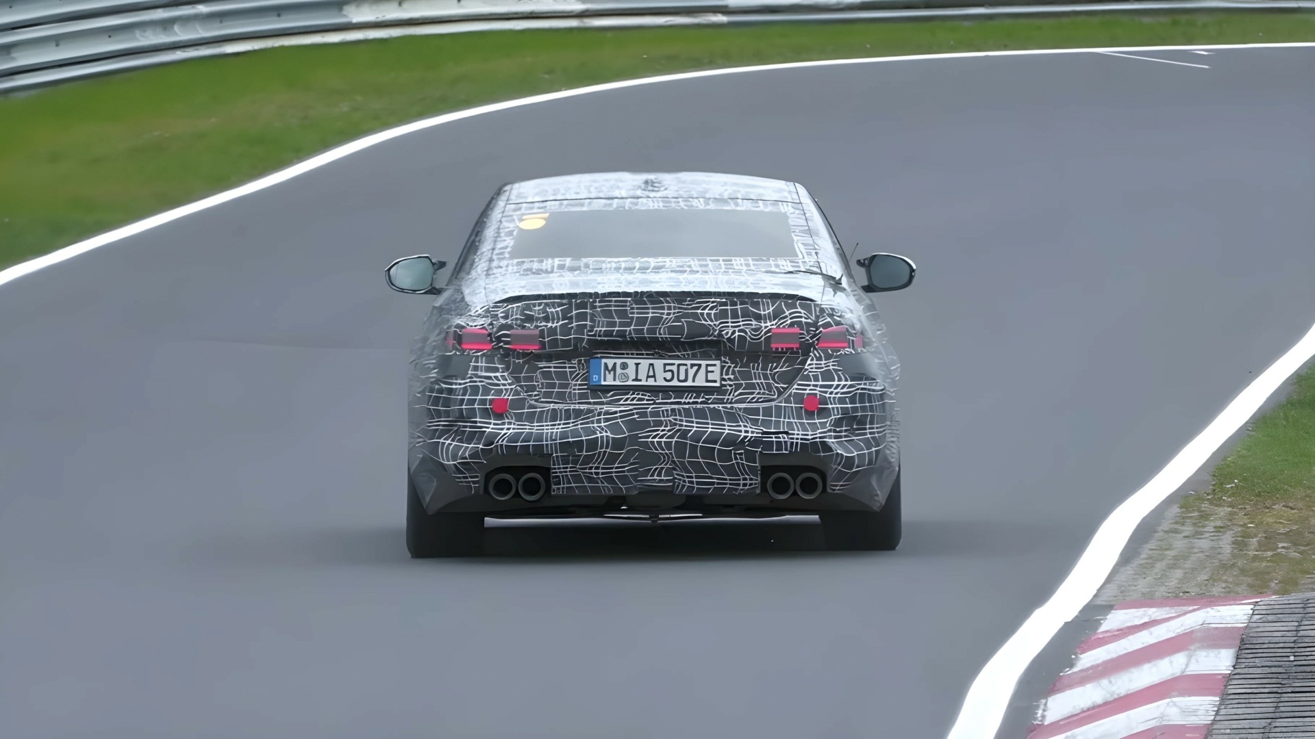 A Spyshot Of The Rear Profile Of The 2025 BMW M5 Plug-In-Hybrid Prototype (Credits CarSpyMedia YouTube Channel)