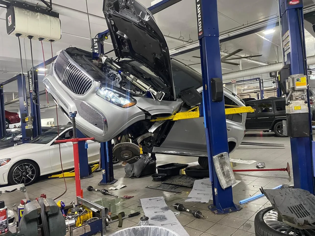 Expensive Mercedes-Maybach GLS 600 Falls Off Lift at Auto Shop