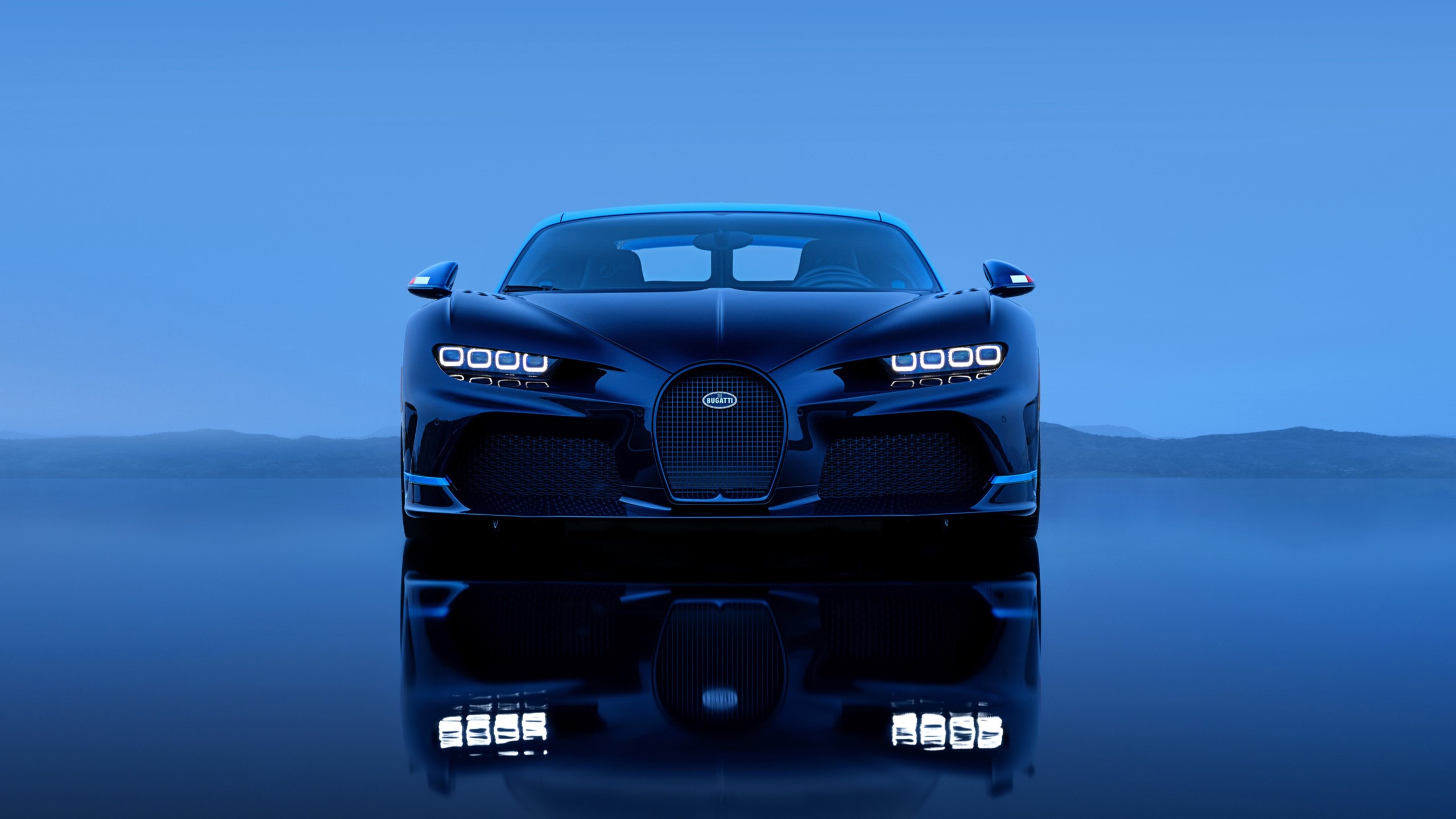 Head-On View Of A Bugatti L’Ultime Super Sport In A Fade Of French Racing Blue And Atlantic Blue