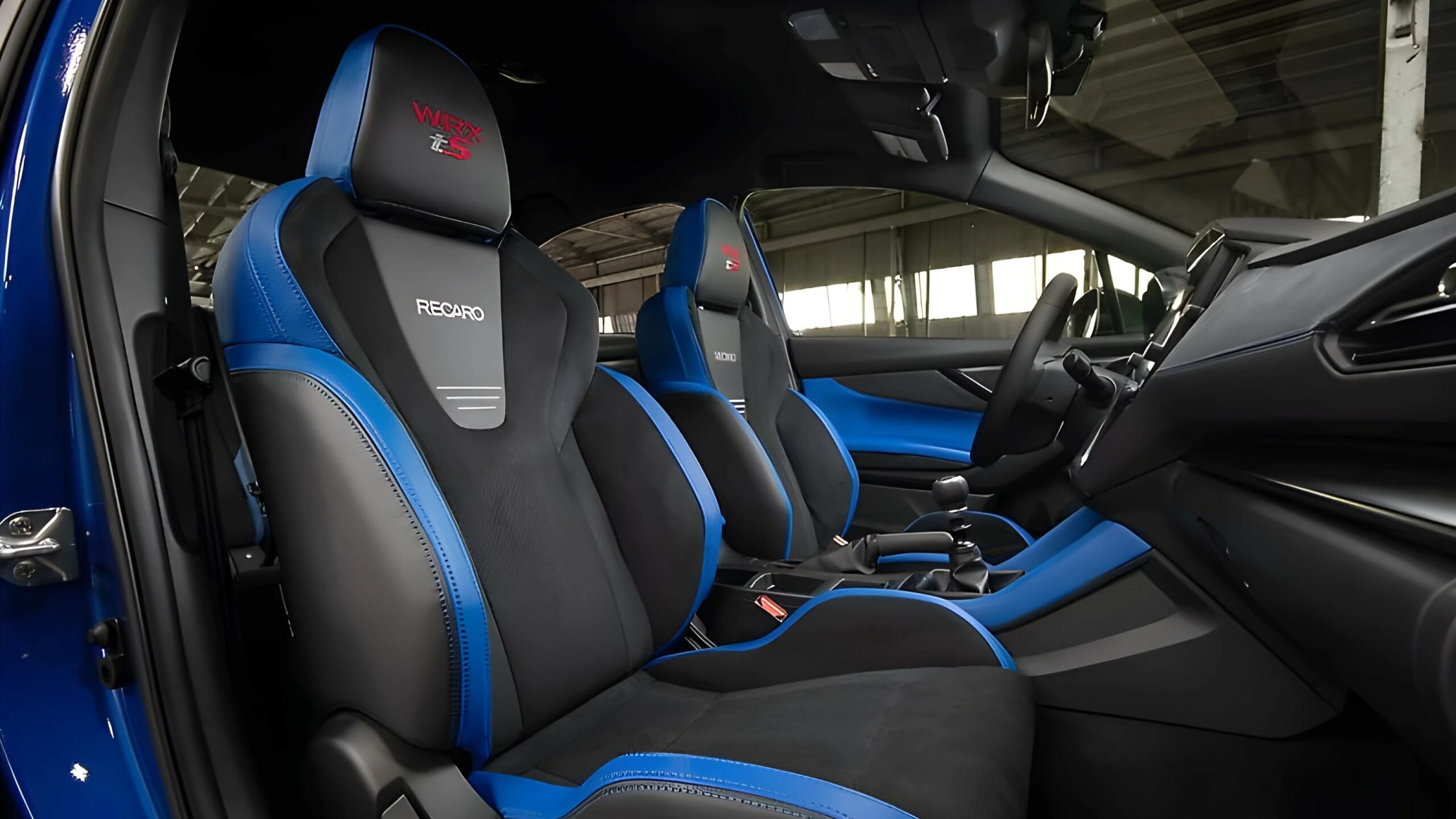 The Blue Accented Seat Bolsters, Steering Wheel And Door Panels Of The 2025 Subaru WRX tS (Subaru)