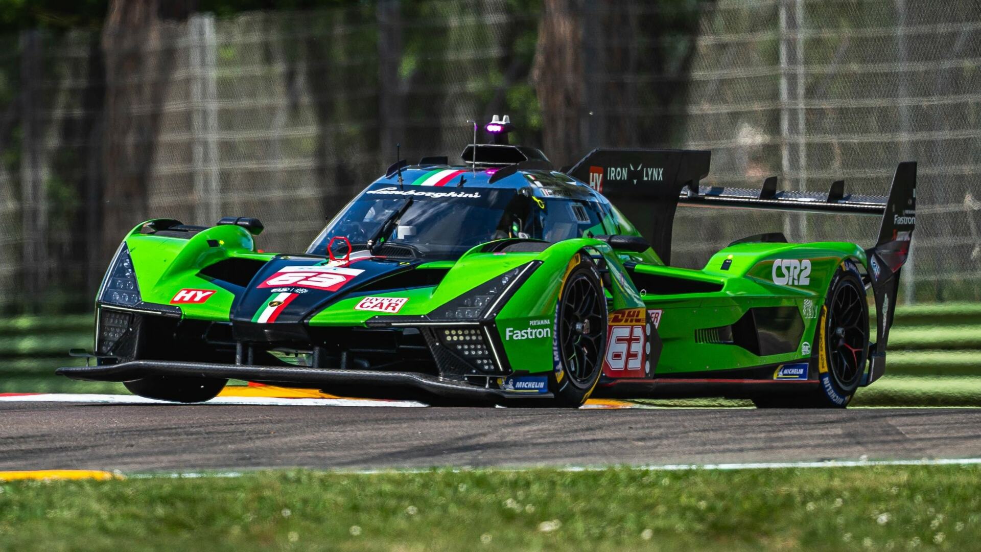 The Front And Side Profile Of The Lamborghini SC63 On The FIA World Endurance Championship Race Track