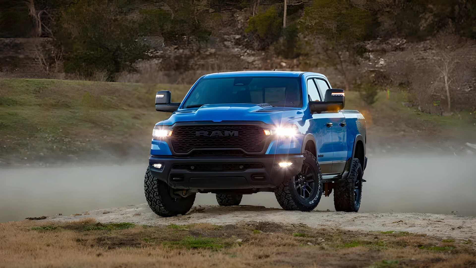 The Front And Side Profiles Of The 2025 Ram 1500 - Exterior Shade Hydro Blue Pearl-Coat (Credits am Trucks)
