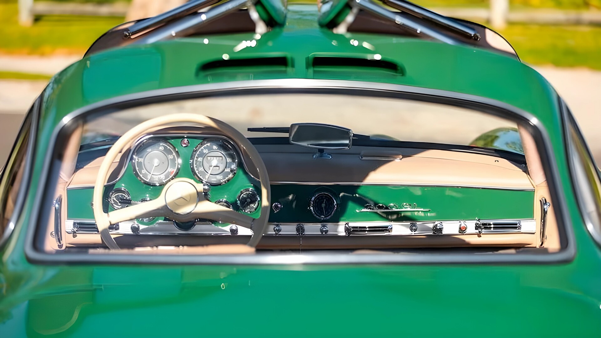 The Green And Gray Leather-Trimmed Interior Of The 1955 Mercedes-Benz 300SL Gullwing Seen From The Rear Windshield