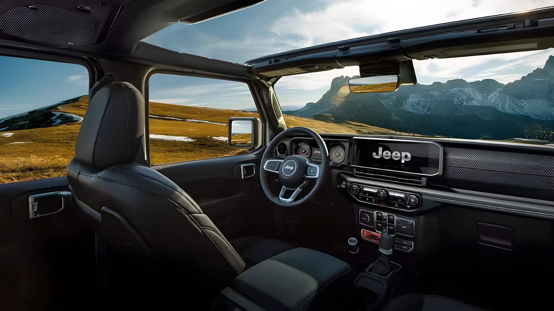 The Interior, Steering, Dashboard, And Central Console Of A 2024 Jeep Gladiator 4xe (Credits Jeep)