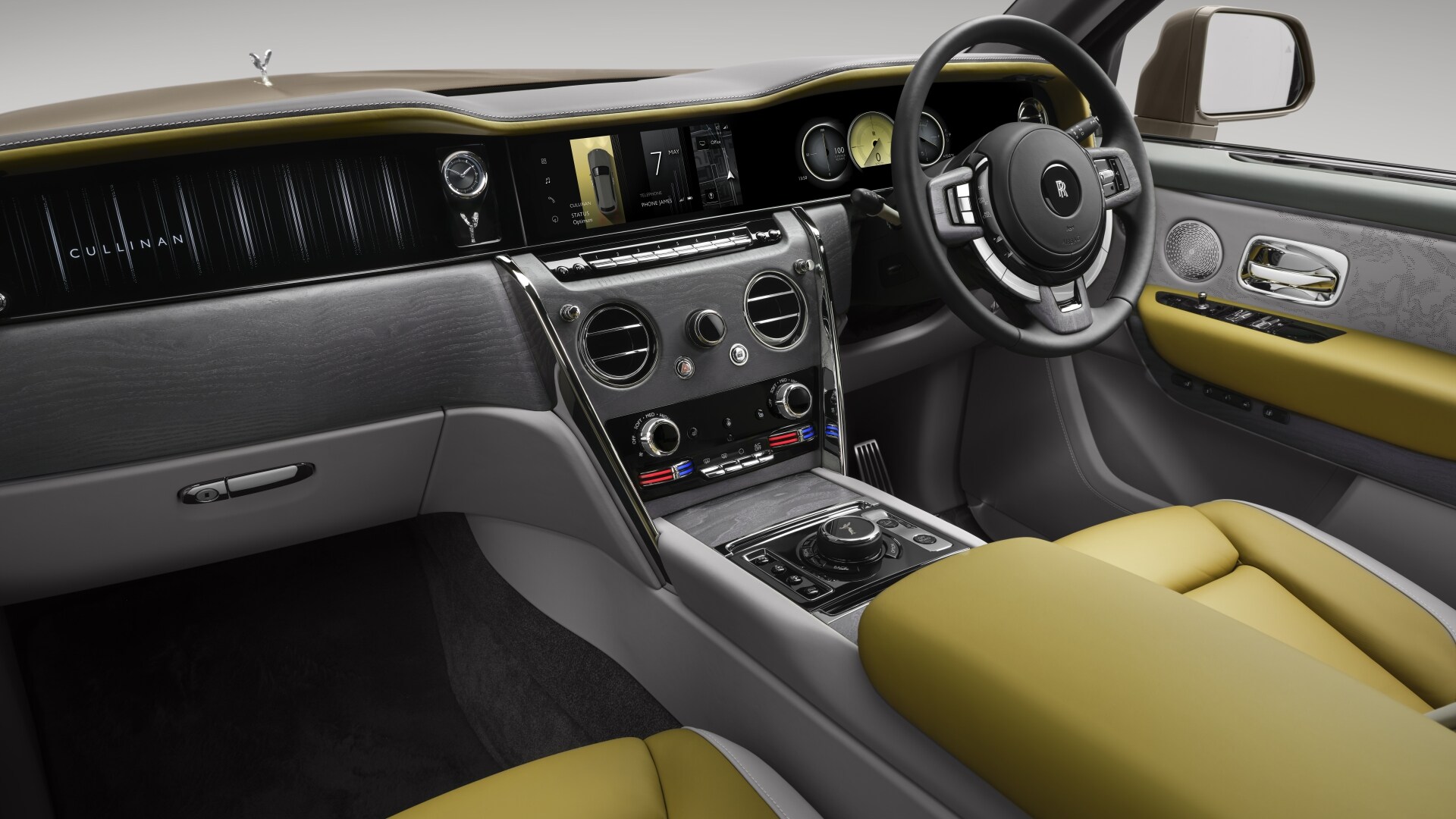 The Interior, Steering, Dashboard, And Central Console Of A Rolls-Royce Cullinan Series II