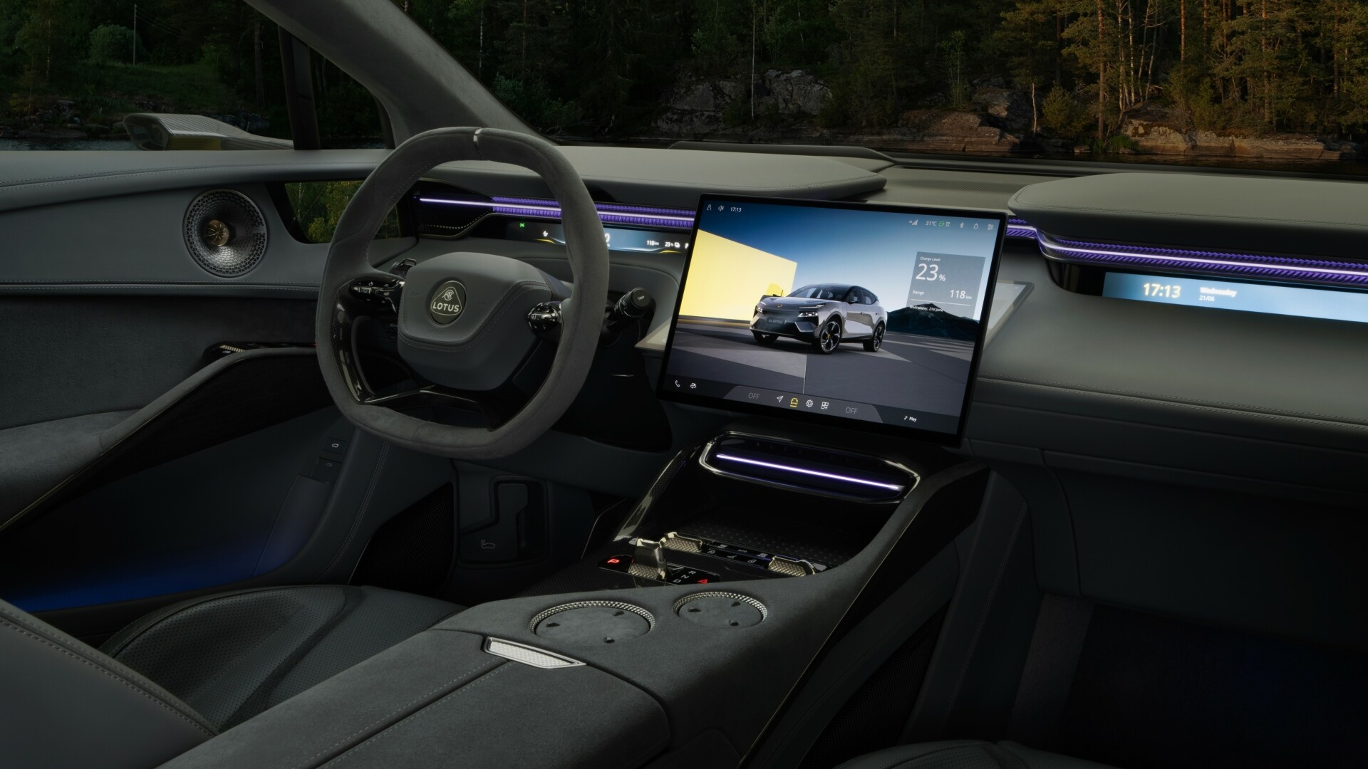 The Interior, Steering Wheel, And Central Console Of A Lotus Eletre S