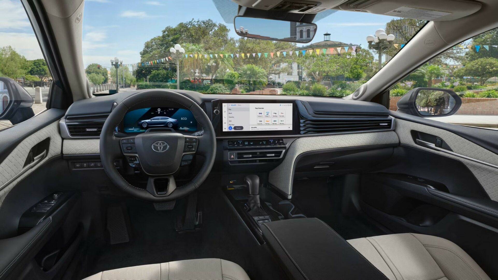 The Interior, Steering Wheel, Dashboard, And Central Console Of A 2025 Toyota Camry