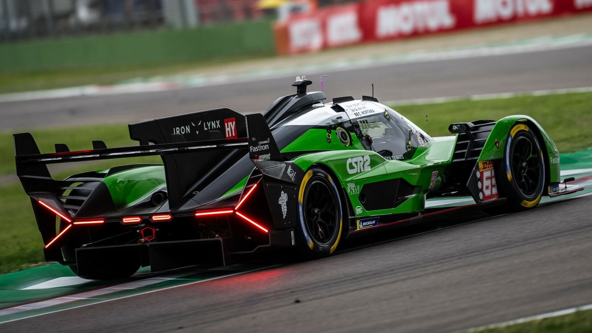 The Rear And Side Profile Of The Lamborghini SC63 On The FIA World Endurance Championship Race Track