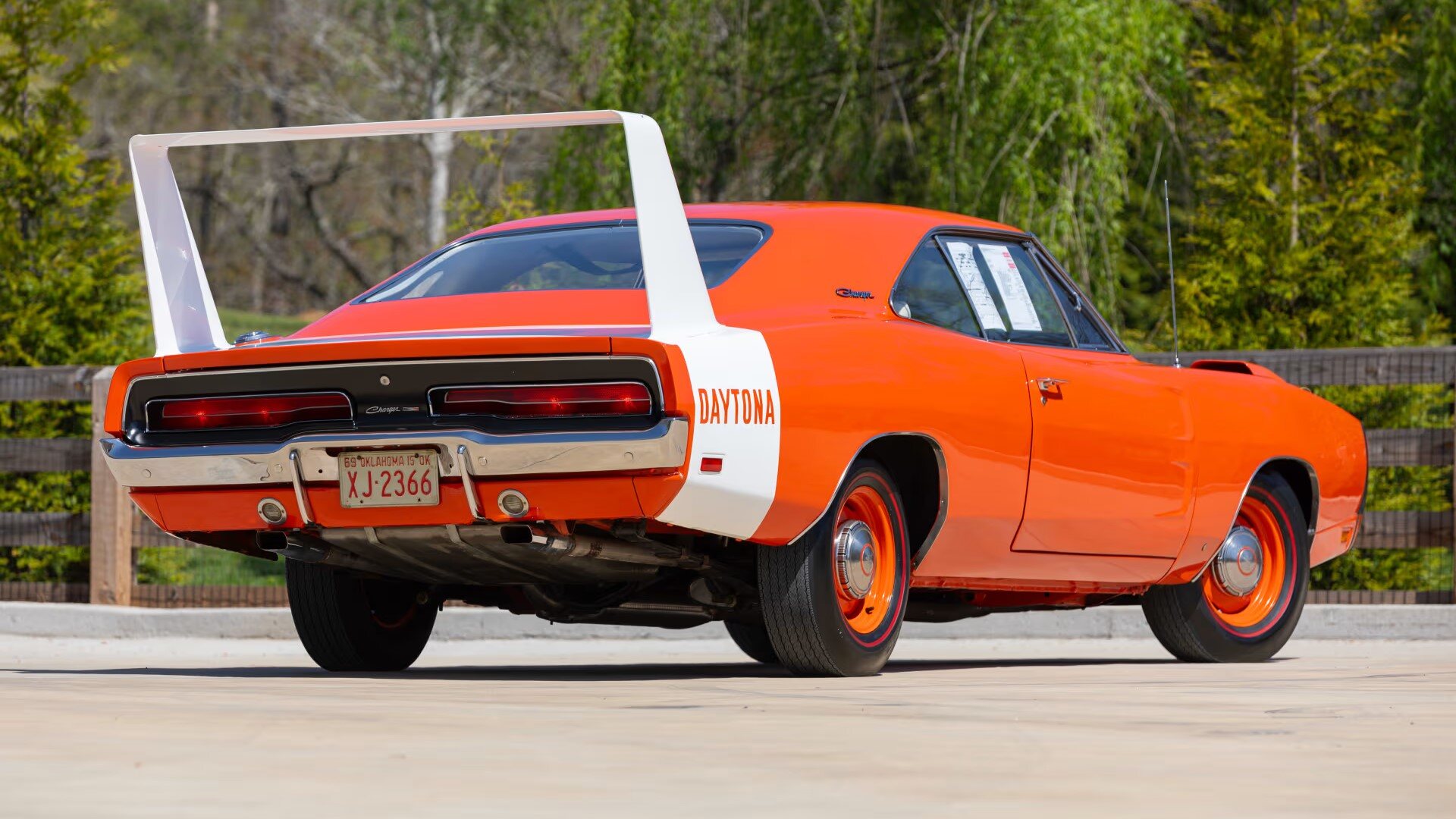 The Rear And Side Profiles Of The 1969 Dodge Charger Daytona - Exterior Shade Hemi Orange Interior White