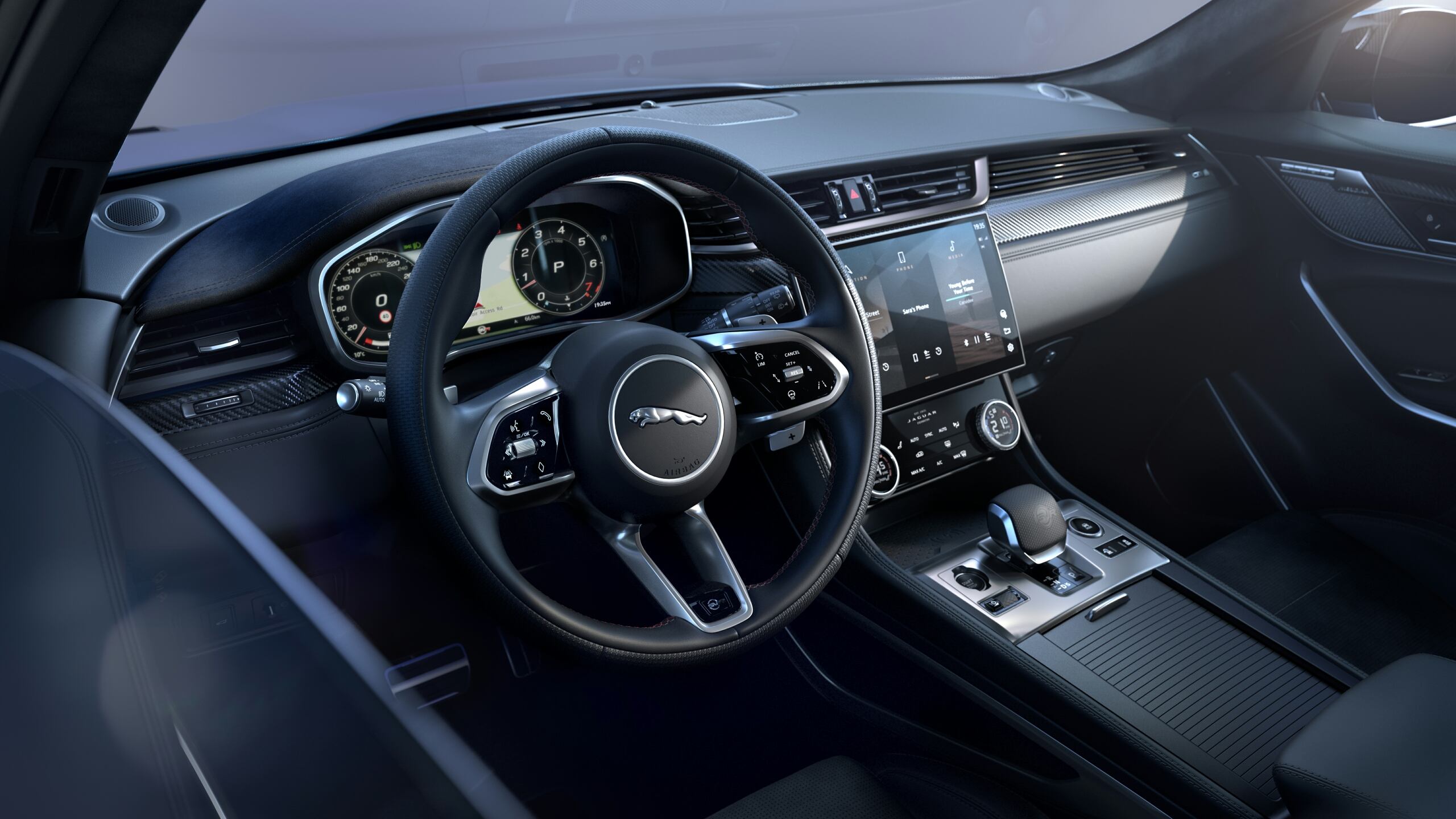 The Steering Wheel, Dashboard, And Center Console Of The Jaguar F-PACE 90th Anniversary Edition