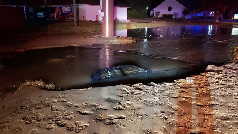 Sinkhole Opens Up After Car Collides with Fire Hydrant and SUV