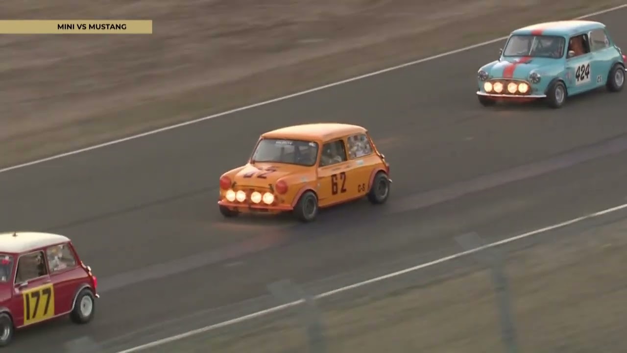 Vintage Racing Spectacle: Minis Clash with Mustangs in Epic Showdown