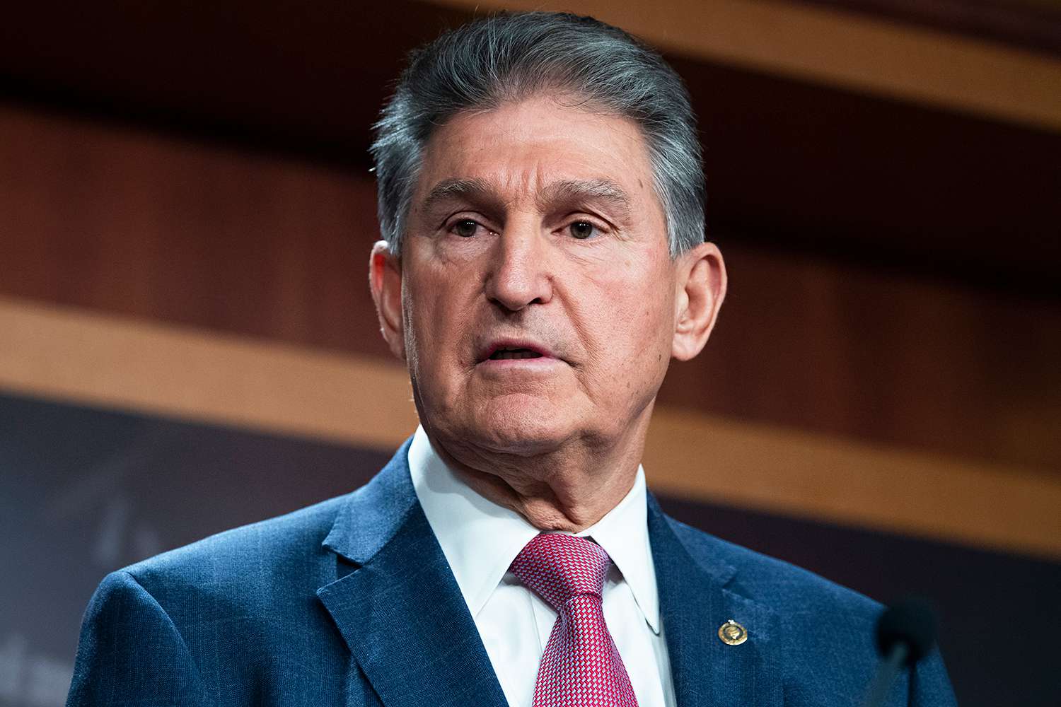 Manchin Advocates for Industry Lawsuit Against Treasury Over EV Credits