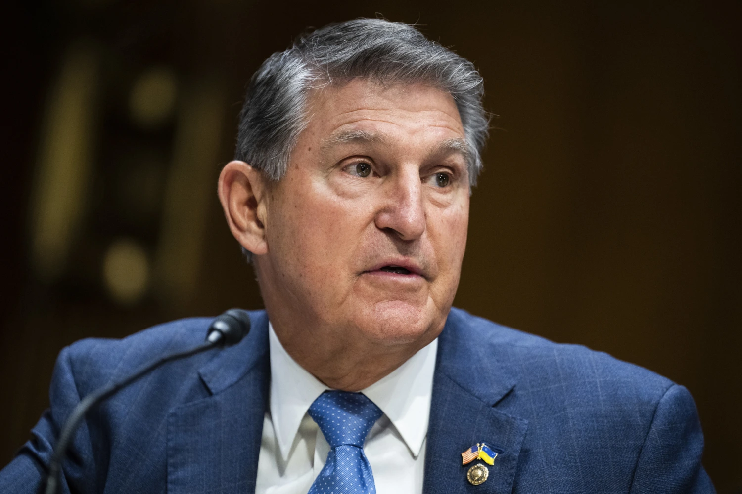 Manchin Advocates for Industry Lawsuit Against Treasury Over EV Credits