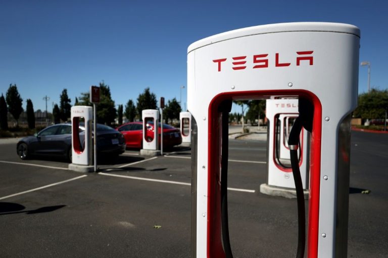 EV Charging Network Wars Tesla vs Rivals in 2025