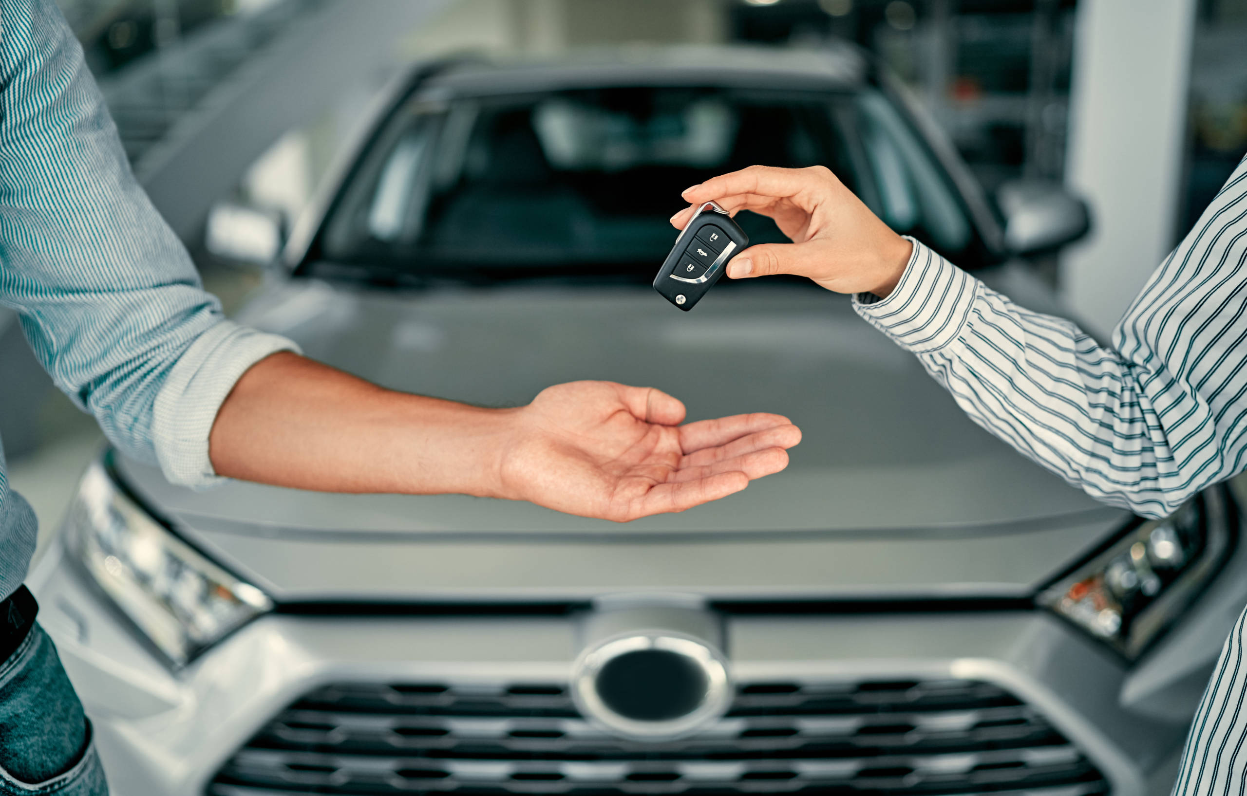 At a car dealership, buying a car