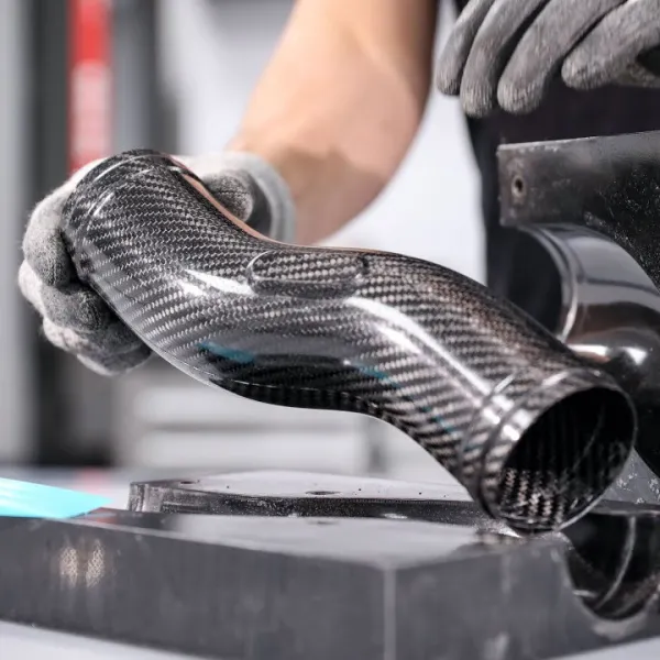 Composite Exhaust Systems with Carbon Fiber Components