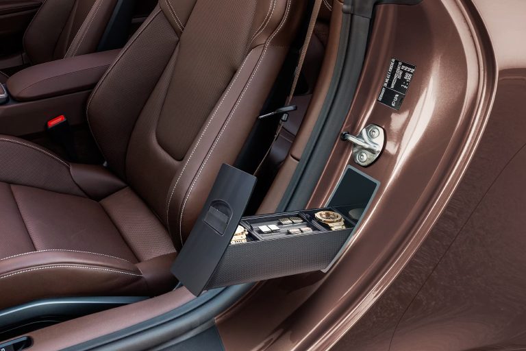 Porsche’s Concealed Door Frame Cubby (1)