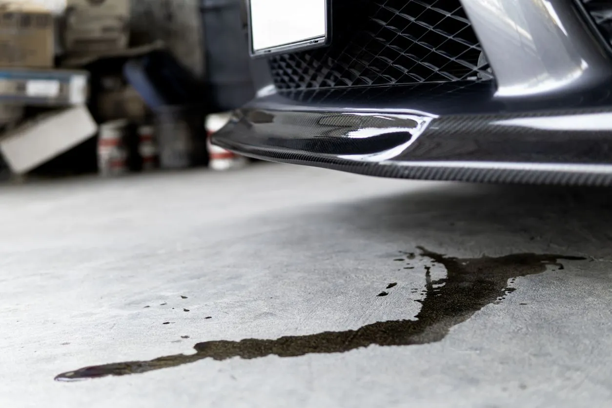 A Parked Car Leaking Oil A Parked Car Leaking Oil