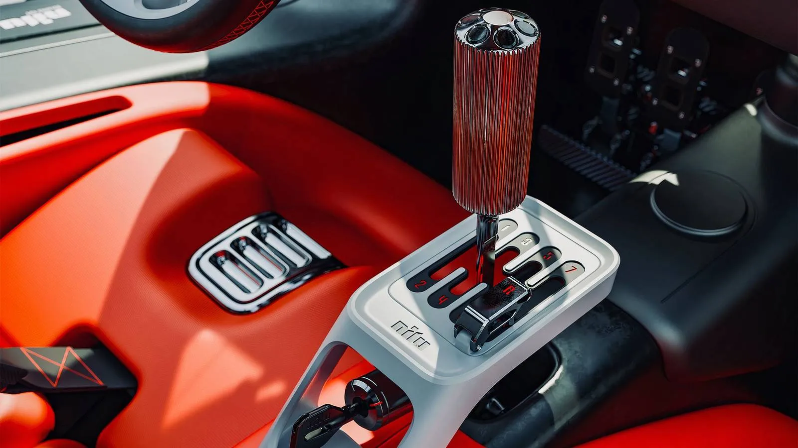 Manual gear shifter inside the cockpit of the Nilu27 hypercar