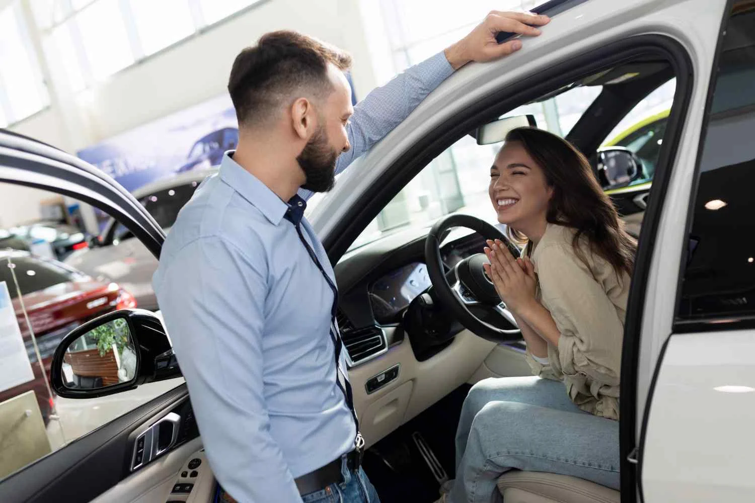 Interaction with a car dealer while examining the interior Interaction with a car dealer while examining the interior