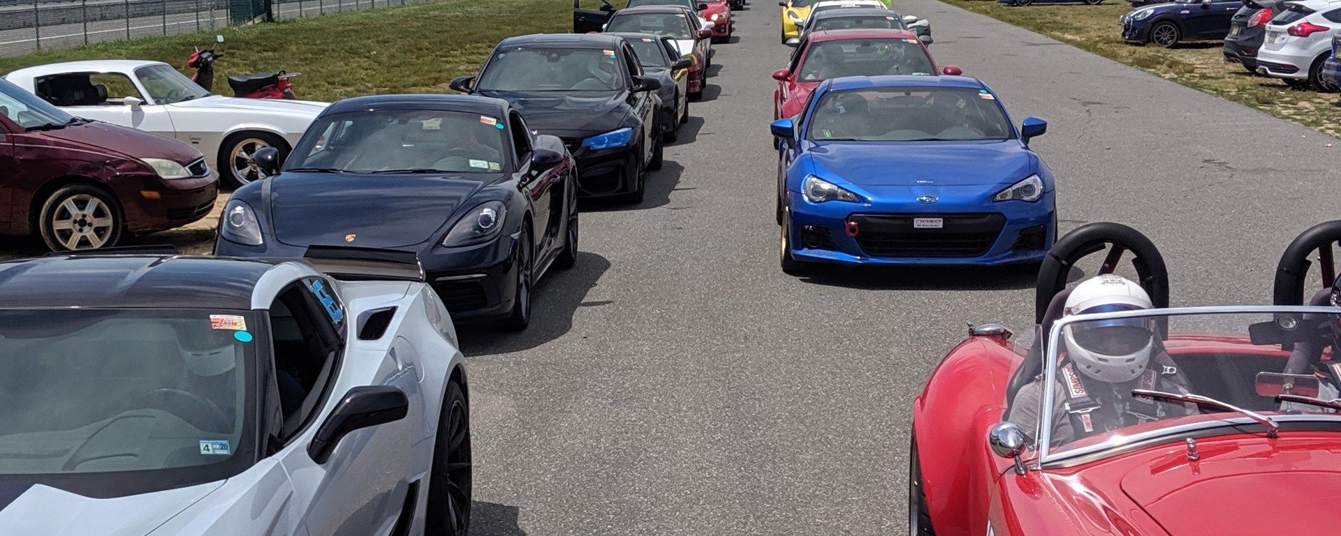 Track day event featuring several sports cars